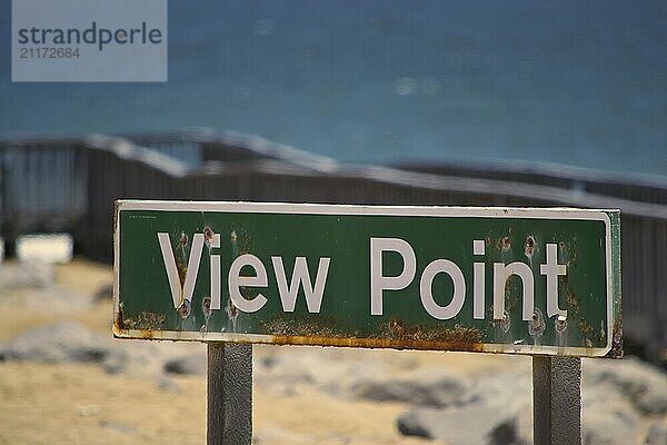 Rusty and weathered View Point sign. White letters on green background