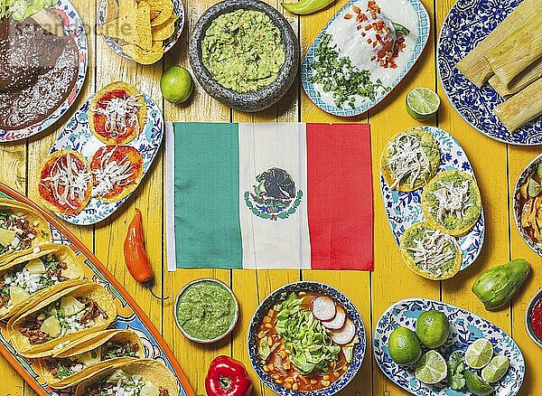 Food  Food  Mexican festive food for independence day independencia  around mexican flag. Top view  Yellow background