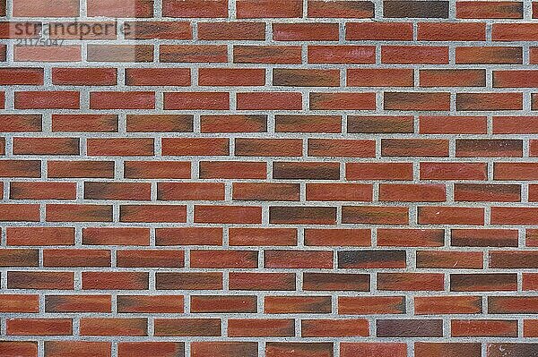 An evenly laid brick wall made of red bricks. The joints are clean and regular  Bergen  Vestland  Norway  Europe