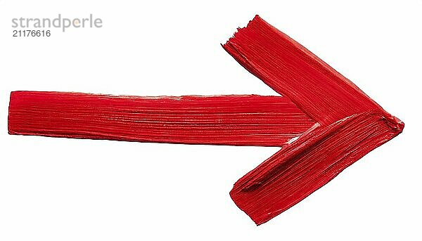 Red arrow with paint on a white background