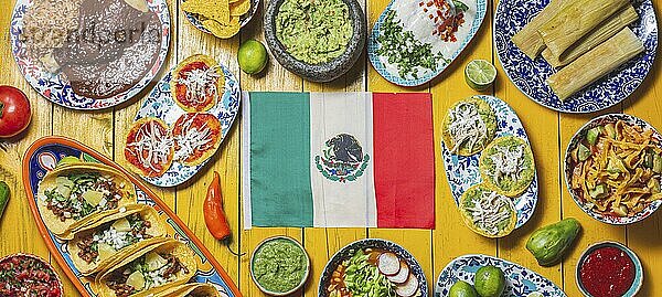 Food  Food  Mexican festive food for independence day independencia  around mexican flag. Top view  Yellow background