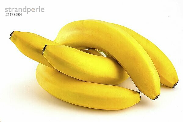 Ripe bananas isolated on white background. A bunch of fruits lie on white