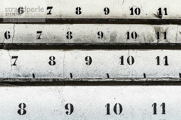 Numbers lined up in a row against a white background