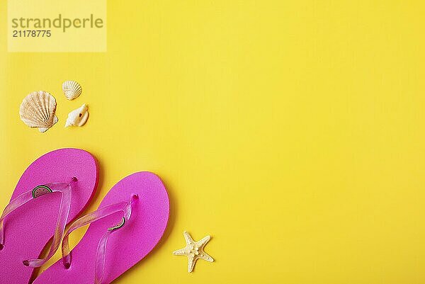 Flip flops with shells and starfishes on yellow background vacation travel planning mockup