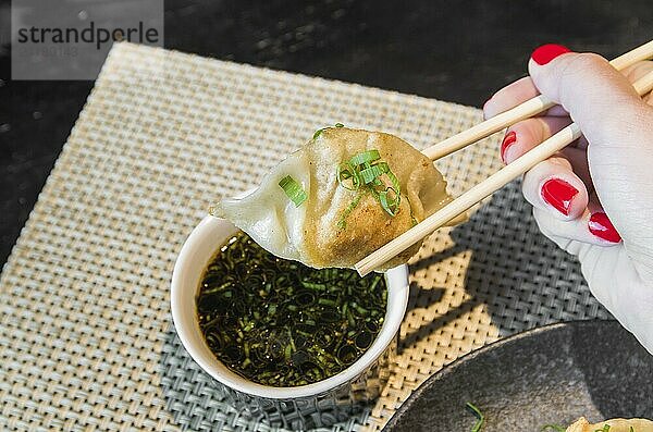 Beautiful gyoza or dumplings snack with soy sauce  selective focus  copy space