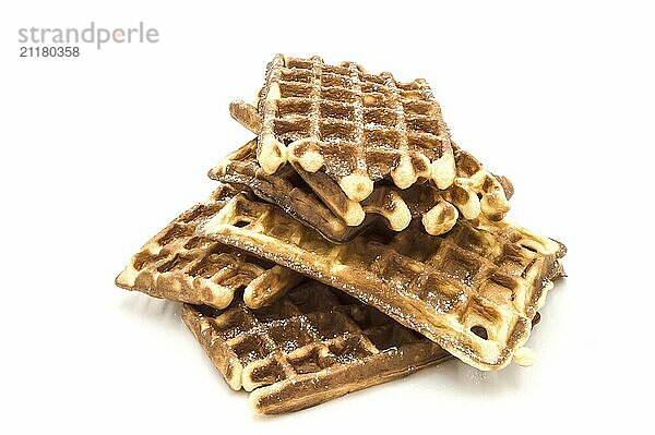 Mound of Belgian waffles on a white background