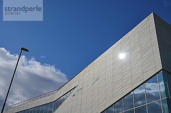 Modern building More og Romsdal Art Centre with glass front and reflecting blue sky  Molde  Romsdal  Norway  Europe