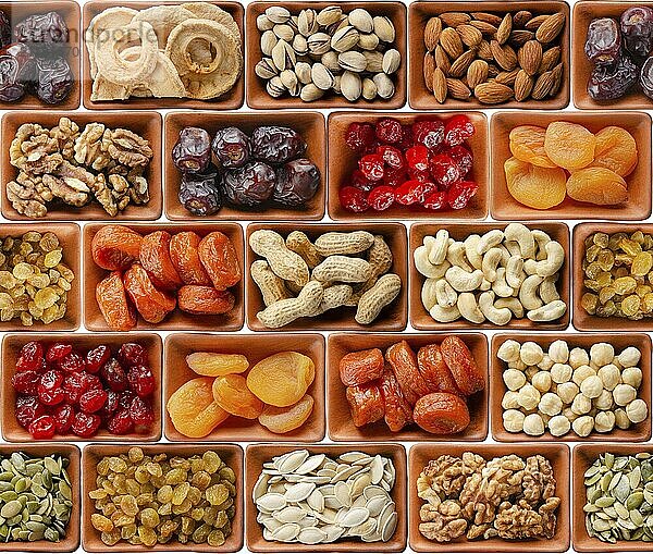 Seamless flat lay food background of dehydrated fruits  seeds and nuts on white. Non-perishable antioxidant gluten free foods concept