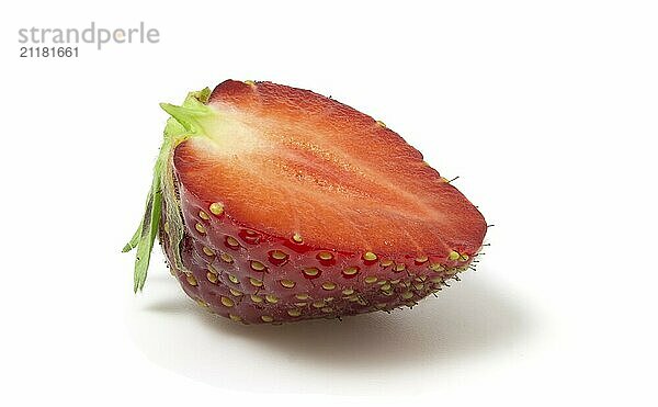 Isolated half of strawberry on a white background