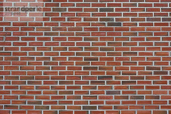 An evenly laid brick wall made of red bricks. The joints are clean and regular  Bergen  Vestland  Norway  Europe