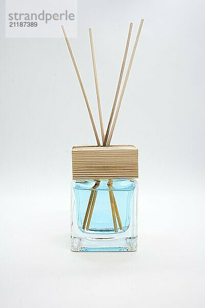 A Bottle of Lavender Fragrant Oil Diffuser with Reed Sticks  isolated on white