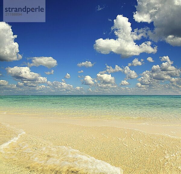 Beautiful landscape with white sandy sea spit beach and warm tropical ocean