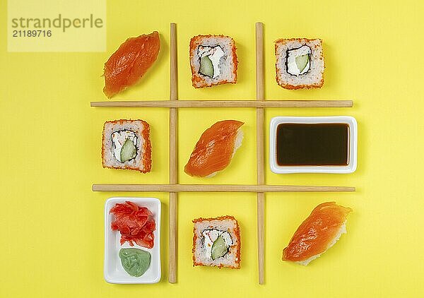 Food  Food  Creative Arrangement of Sushi and Sashimi on Yellow Background for Japanese Cuisine Concept