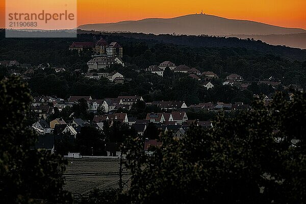 View over Ballenstedt to the Brocken at sunset