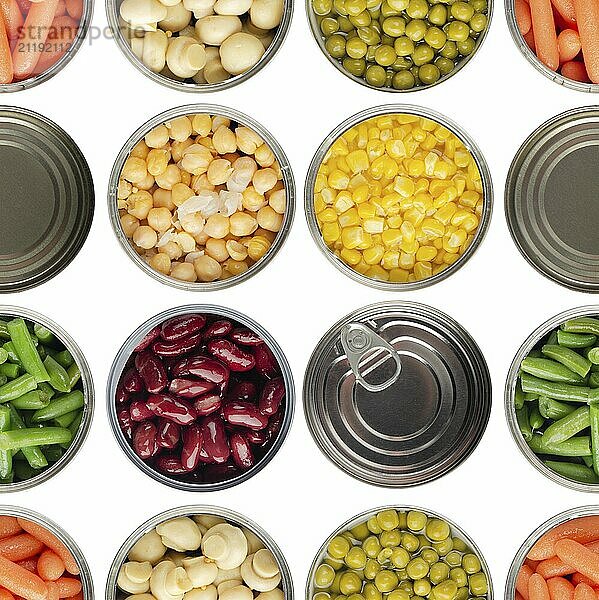 Seamless food background made of opened canned chickpeas  green sprouts  carrots  corn  peas  beans and mushrooms on white background