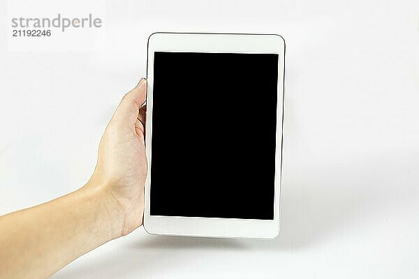 Photo of Digital tablet in one hand  on a white background  isolated