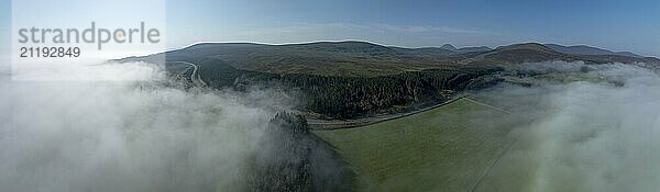 Coastal fog in the Scottish Highlands with hills  drone image  Broch of Ousdale  Berriedale  Scotland  Great Britain