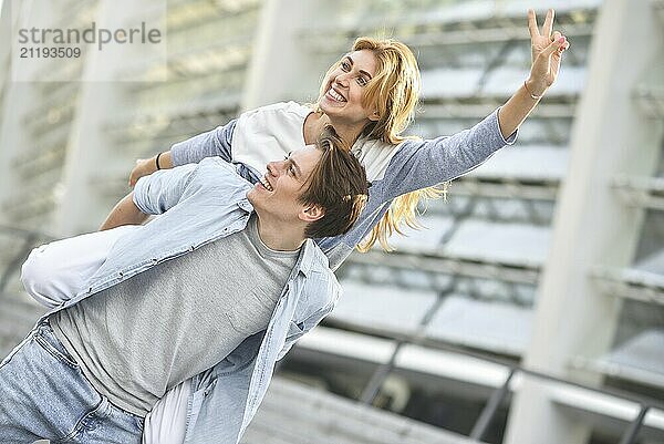 Beautiful couple in love dating outdoors and smiling