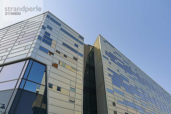 Modern building with glass façade  many windows and bright blue sky  Sandnes  Fylke Rogaland  Norway  Europe