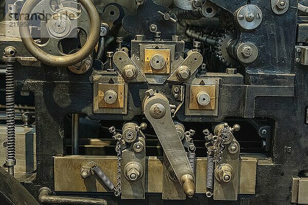 Mechanical industry old machinery part dark background