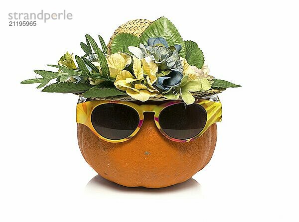 One big orange pumpkin with sunglasses over white background