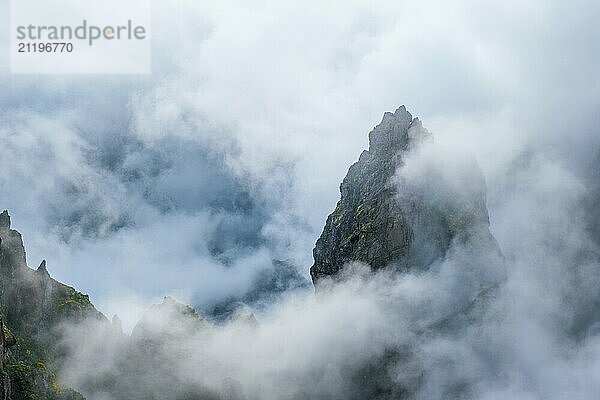 A mountain covered in fog and clouds. Near Pico de Arieiro  Madeira island  Portugal  Europe