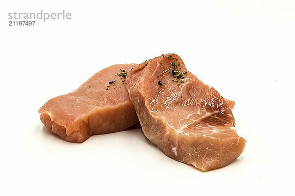 Fresh pork deus mignonettes on a white background