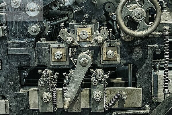 Mechanical industry old machinery part dark background