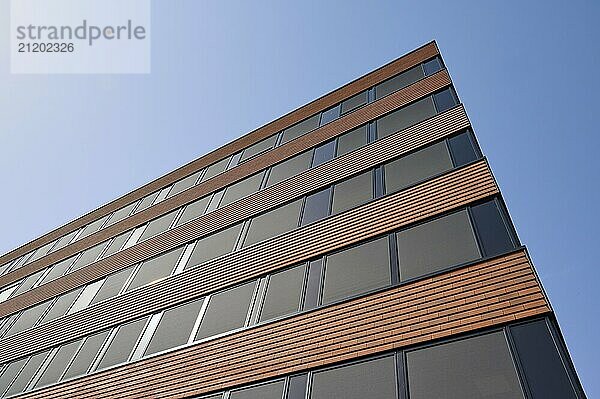 Corner view of a modern building with large windows  sky in the background  Sandnes  Fylke Rogaland  Norway  Europe