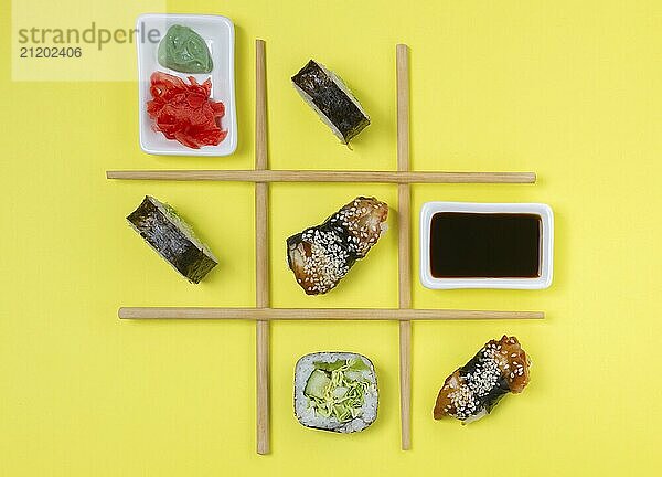 Food  Food  Creative Arrangement of Sushi and Sashimi on Yellow Background for Japanese Cuisine Concept