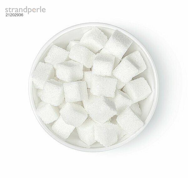 Sugar cubes in bowl isolated on white background  view from above