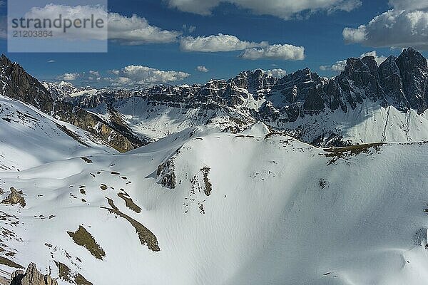 Aerial view of amazing rocky mountains in snow at sunset  Dolomites  Italy  Europe