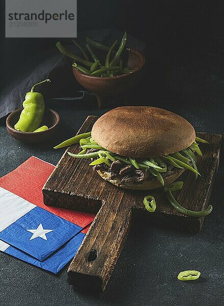 Food Photography  Chilean Latin american sandwich burger Chacarero with premium beef slices and green bean on black background