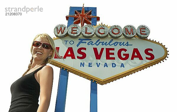 Pretty girl standing in front of the las vegas sign isolated on a white background