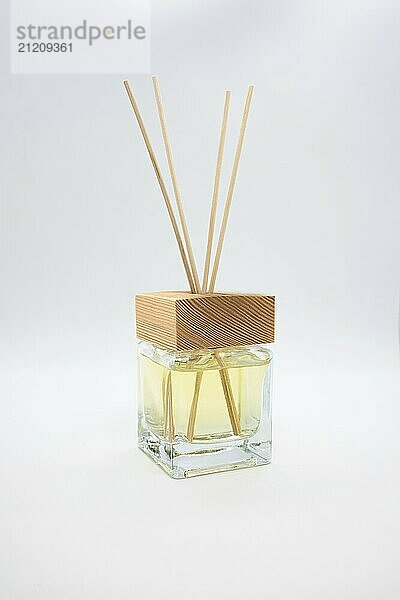 A Bottle of Lavender Fragrant Oil Diffuser with Reed Sticks  isolated on white