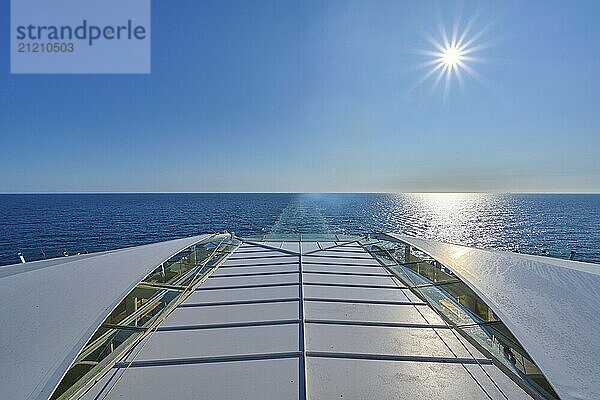 View from the ship's deck  Mein Schiff 6  of the vast sea under bright sunshine and blue skies  North Sea  Norway  Europe