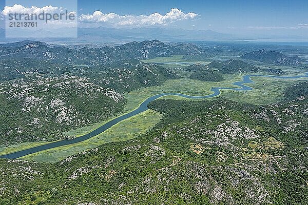 Aerial view of Rijeka Crnojevica  beautiful river between mountains flowing into Skadar Lake  Montenegro  Europe