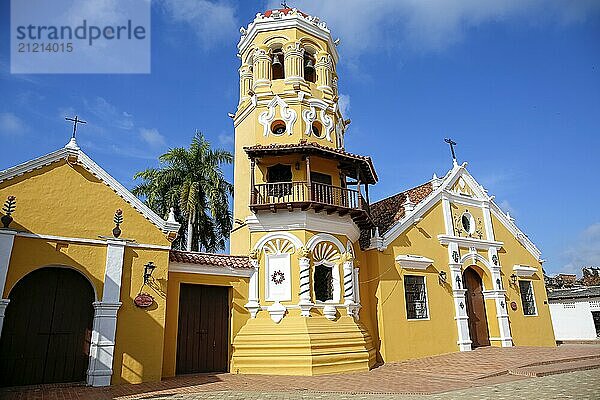 View to beautiful historic Church Santa Barbara (Iglesia de Santa Barbara) Santa Cruz de Mompox in sunlight and blue sky  World Heritage