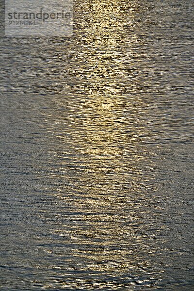 Sunset over the North Sea  gentle reflection of the sun's rays in the water  Bergen  North Sea  Norway  Europe