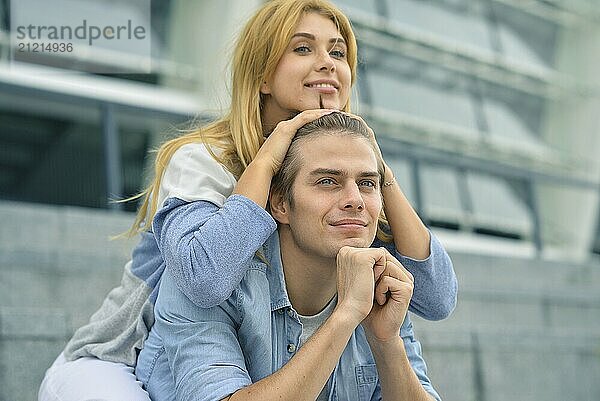 Beautiful couple in love dating outdoors and smiling