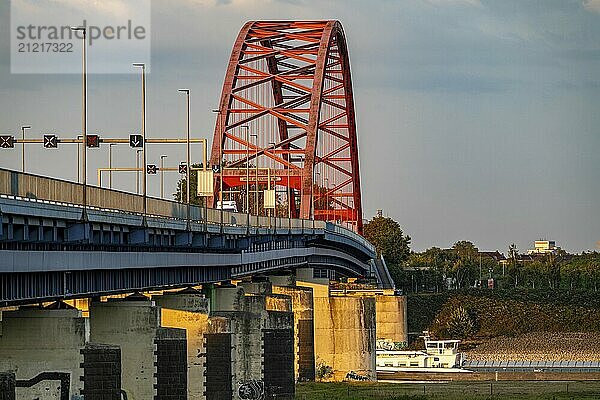 The Bridge of Solidarity  the longest tied-arch bridge in Germany  over the Rhine from Duisburg-Hochfeld to DU-Rheinhausen  the road bridge is dilapidated and has to be rebuilt  many thousands of lorries from the Logport port and cars use the bridge every day  new construction by 2040  Duisburg  North Rhine-Westphalia  Germany  Europe