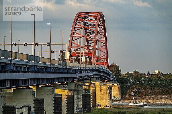 The Bridge of Solidarity  the longest tied-arch bridge in Germany  over the Rhine from Duisburg-Hochfeld to DU-Rheinhausen  the road bridge is dilapidated and has to be rebuilt  many thousands of lorries from the Logport port and cars use the bridge every day  new construction by 2040  Duisburg  North Rhine-Westphalia  Germany  Europe