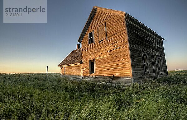 Abandoned Farmhouse Saskatchewan Canada sunset and prairie view