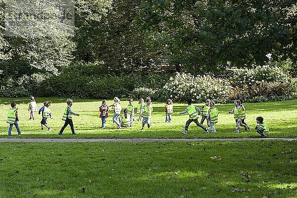 Schoolchildren playing in the castle park  Oslo  Norway  Europe