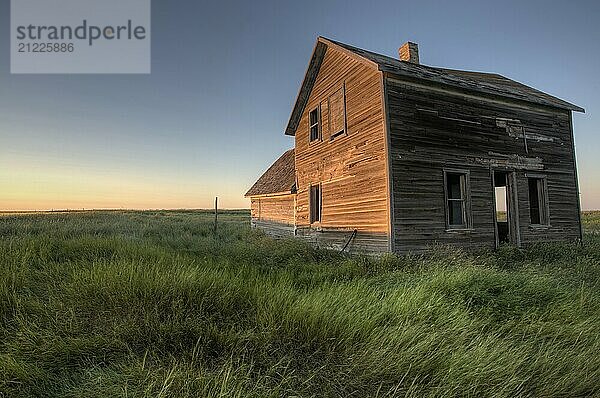 Abandoned Farmhouse Saskatchewan Canada sunset and prairie view