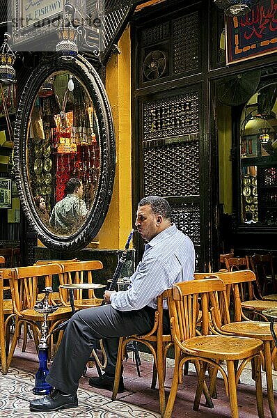 Business man smoking in cairo egypt