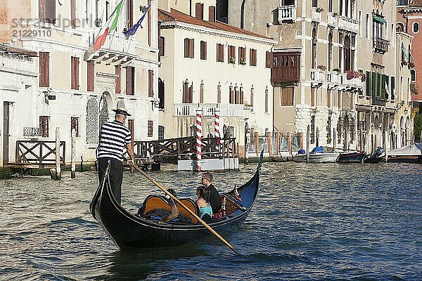 Gondolier in Venice  Veneto  Italy  Europe