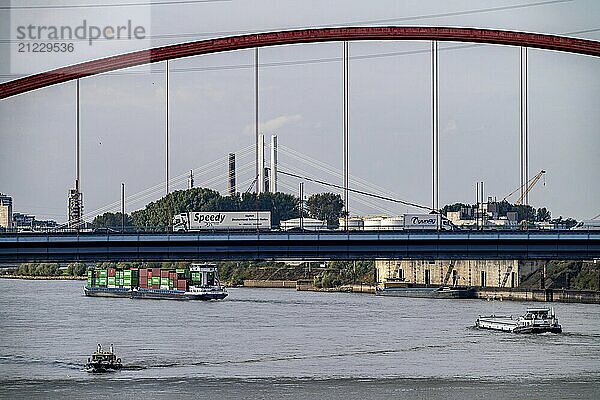 The Bridge of Solidarity  the longest tied arch bridge in Germany  over the Rhine from Duisburg-Hochfeld to DU-Rheinhausen  the road bridge is dilapidated and has to be rebuilt  many thousands of lorries from the Logport port and cars use the bridge every day  new construction until 2040  behind the new Neuenkamp motorway bridge  A40  Duisburg  North Rhine-Westphalia  Germany  Europe