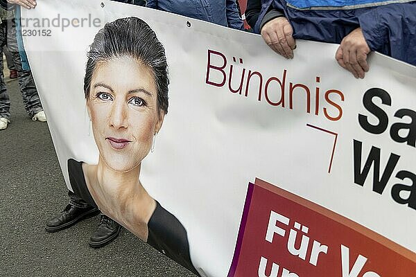 Portrait of Sahra Wagenknecht on a poster of the BSW (Sahra Wagenknecht Alliance) at the Die Waffen nieder demonstration on Breitscheidplatz in Berlin. The event is directed against all wars and calls for an immediate stop to all arms deliveries. Berlin  03.10.2024