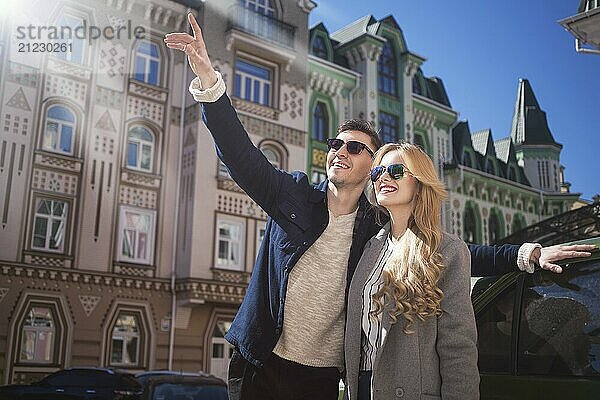 Couple walks in the beautiful city  bright day